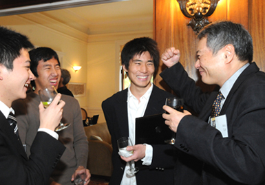 Ang Lee with undergraduate students at the Faculty Club