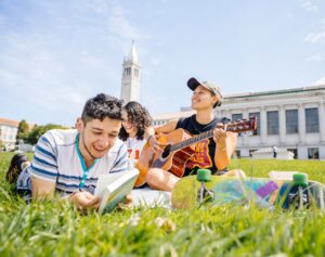 Three students on Memorial Glade